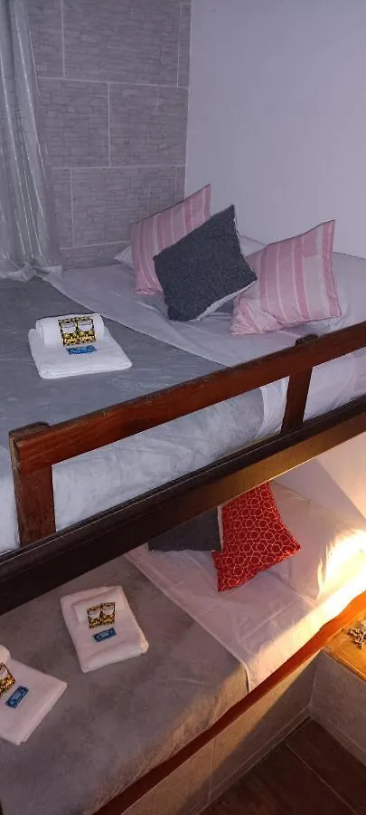 Quarto em Acomodações Particulares Suítes da Orla Cabo Frio