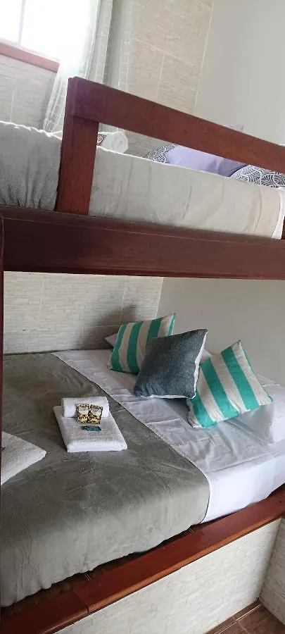 Quarto em Acomodações Particulares Suítes da Orla Cabo Frio Brasil